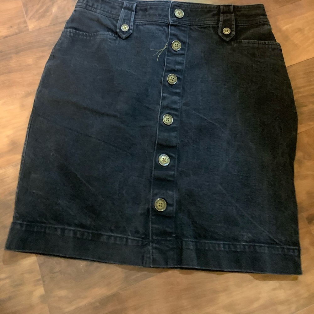 Black denim skirt with front button closure